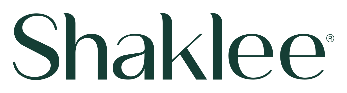 Shaklee のロゴ（背景透過）
